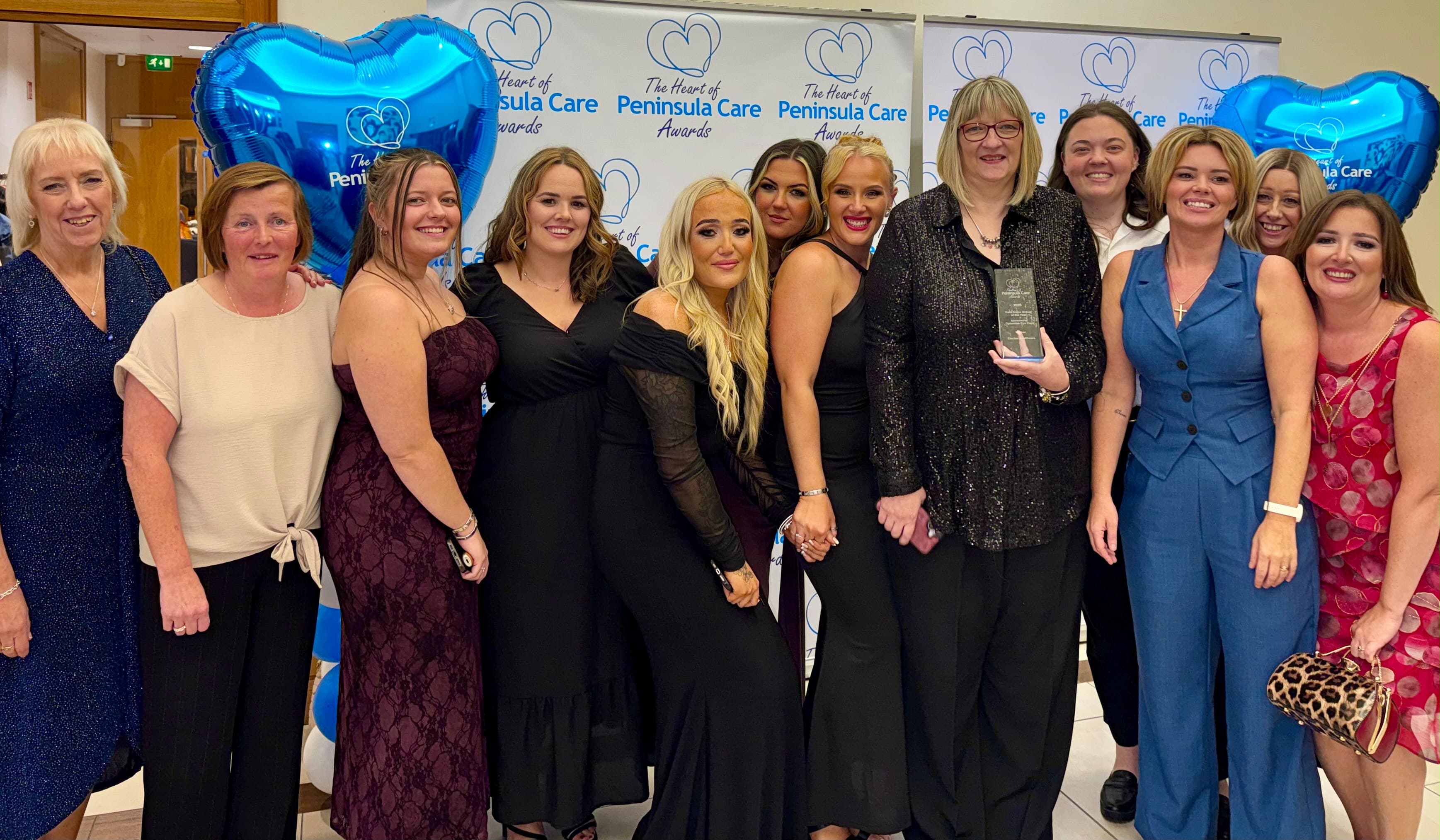 Electus Healthcare colleagues celebrating together at the Heart of Peninsula Care Awards